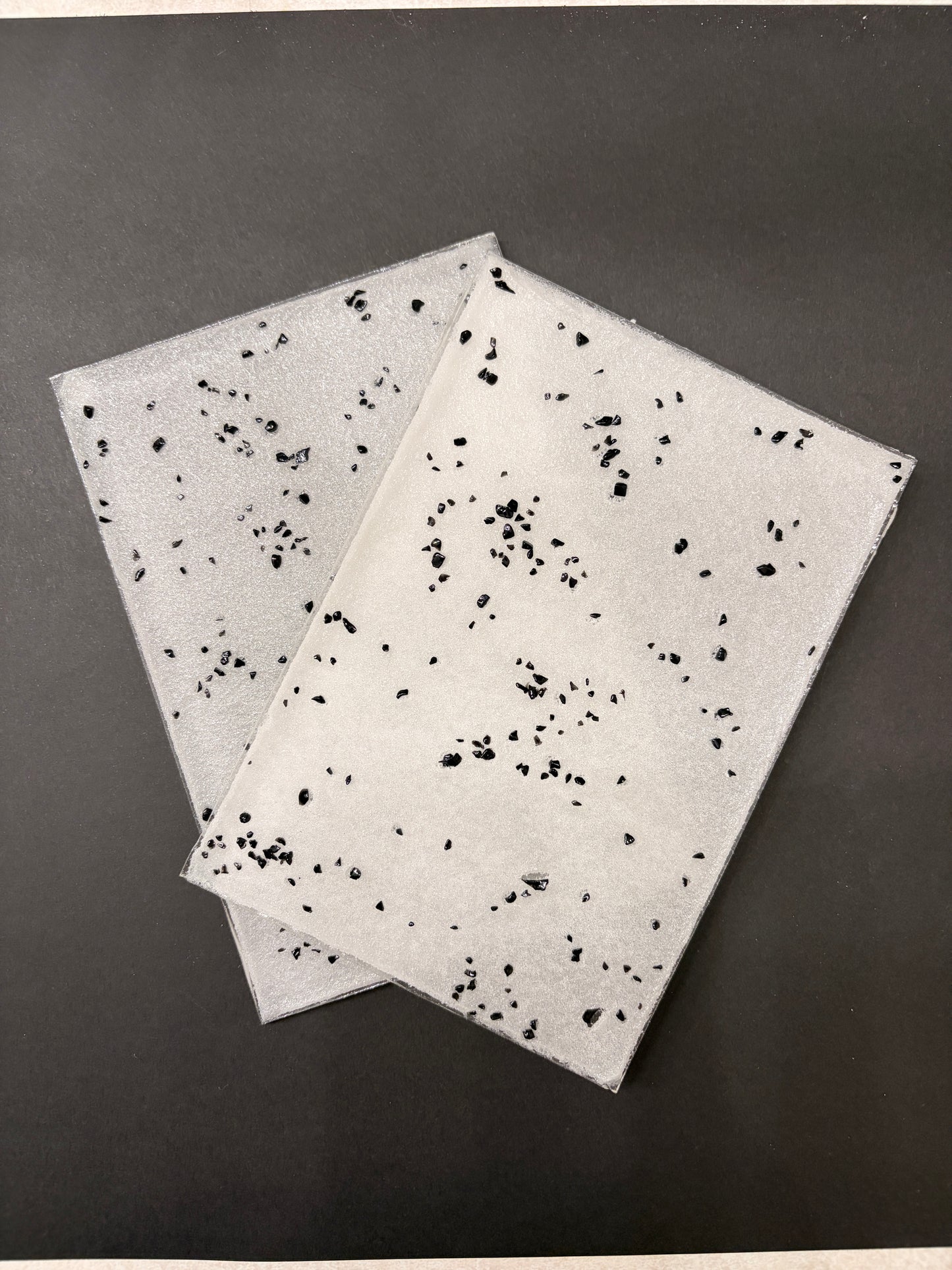 Non Fusible/White with black speckles during day and glows WHITE at night!/ White Ermine