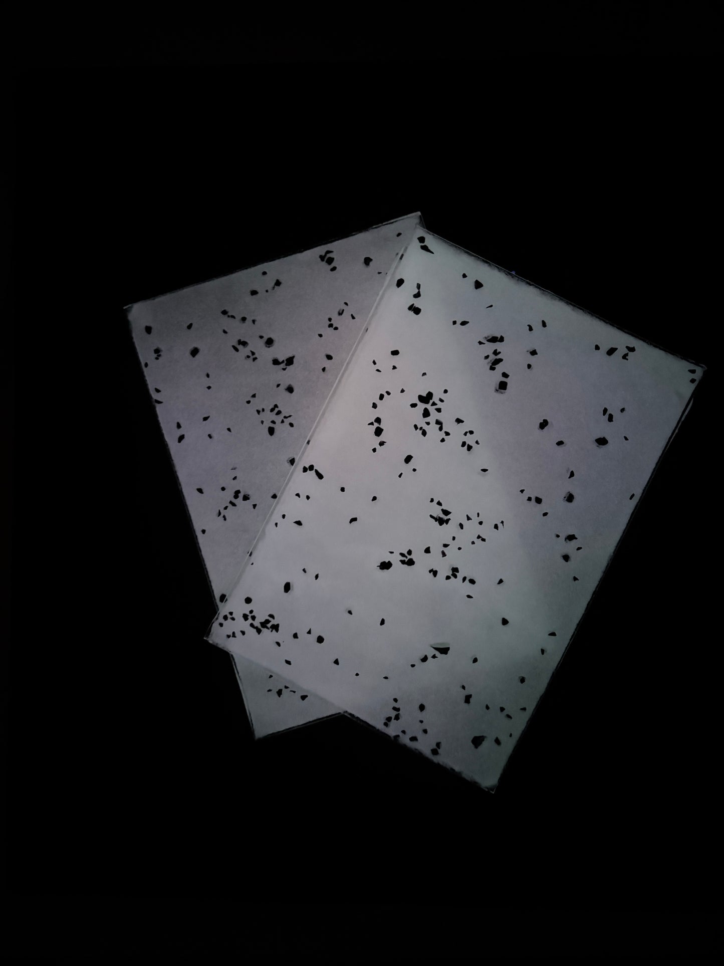 Non Fusible/White with black speckles during day and glows WHITE at night!/ White Ermine