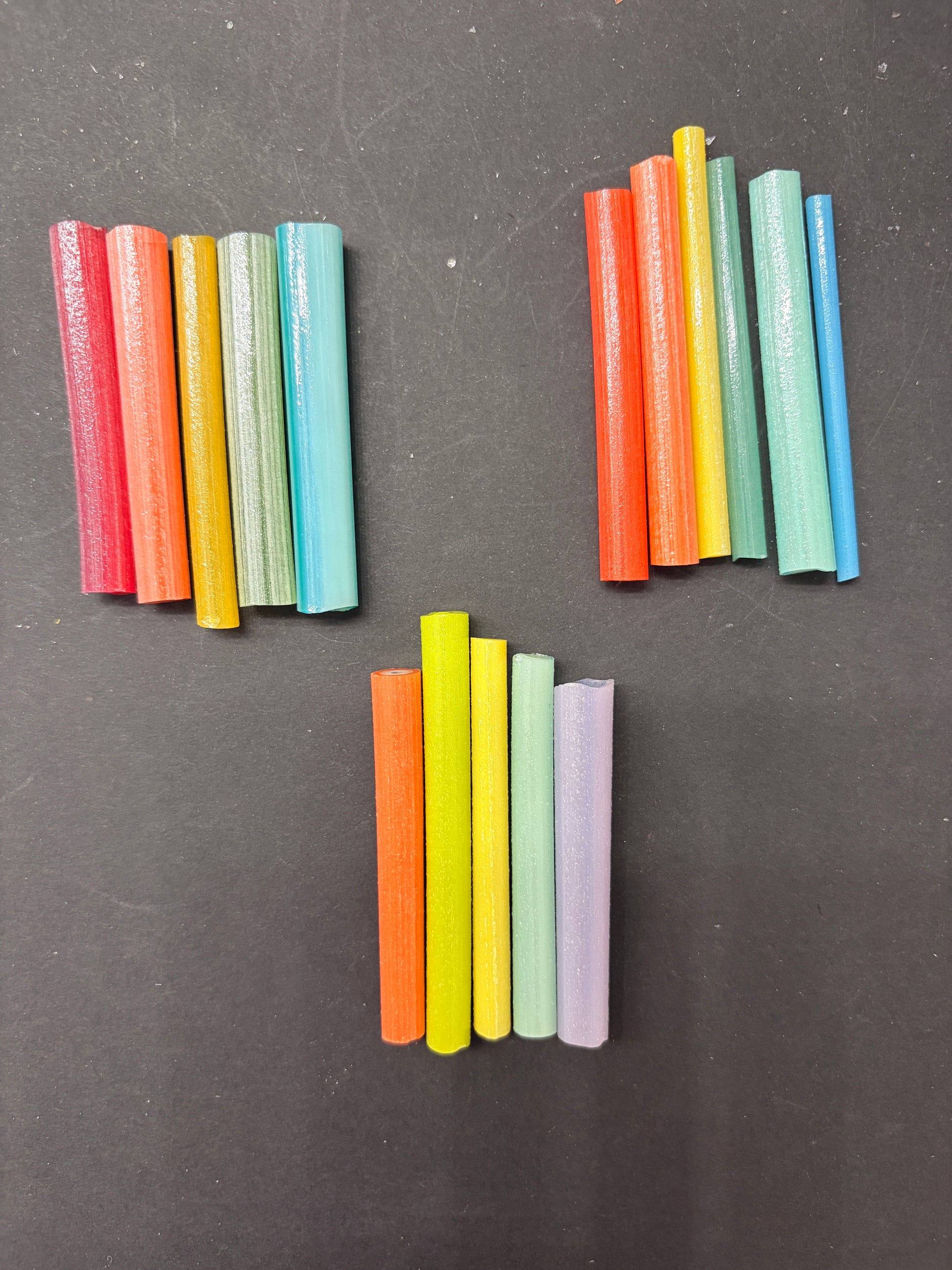 Cane in a rainbow of colours that glows different colours at night