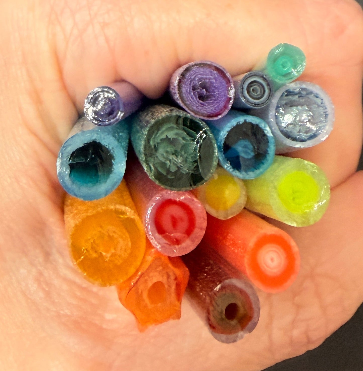 Cane in a rainbow of colours that glows different colours at night