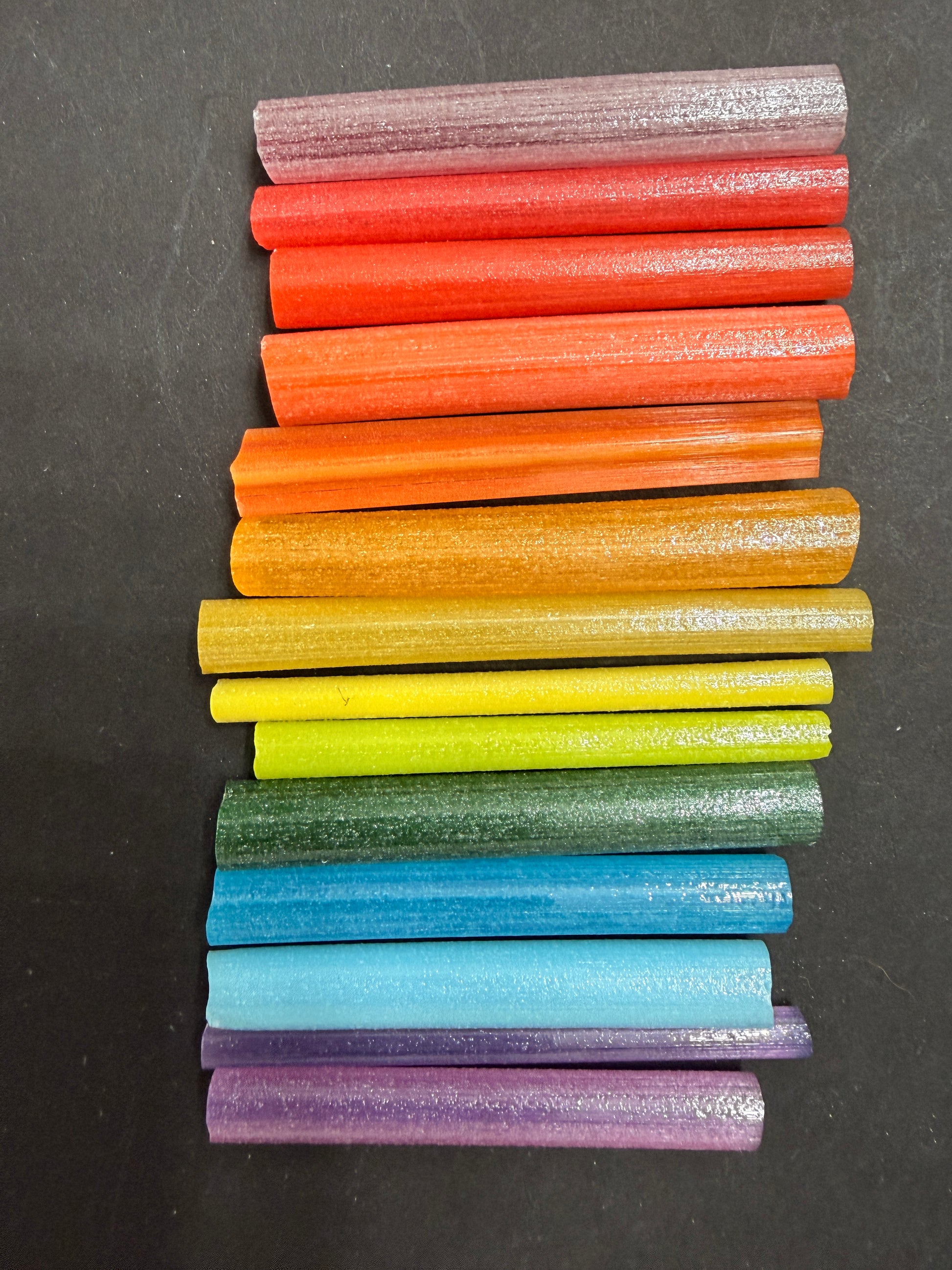 Cane in a rainbow of colours that glows different colours at night