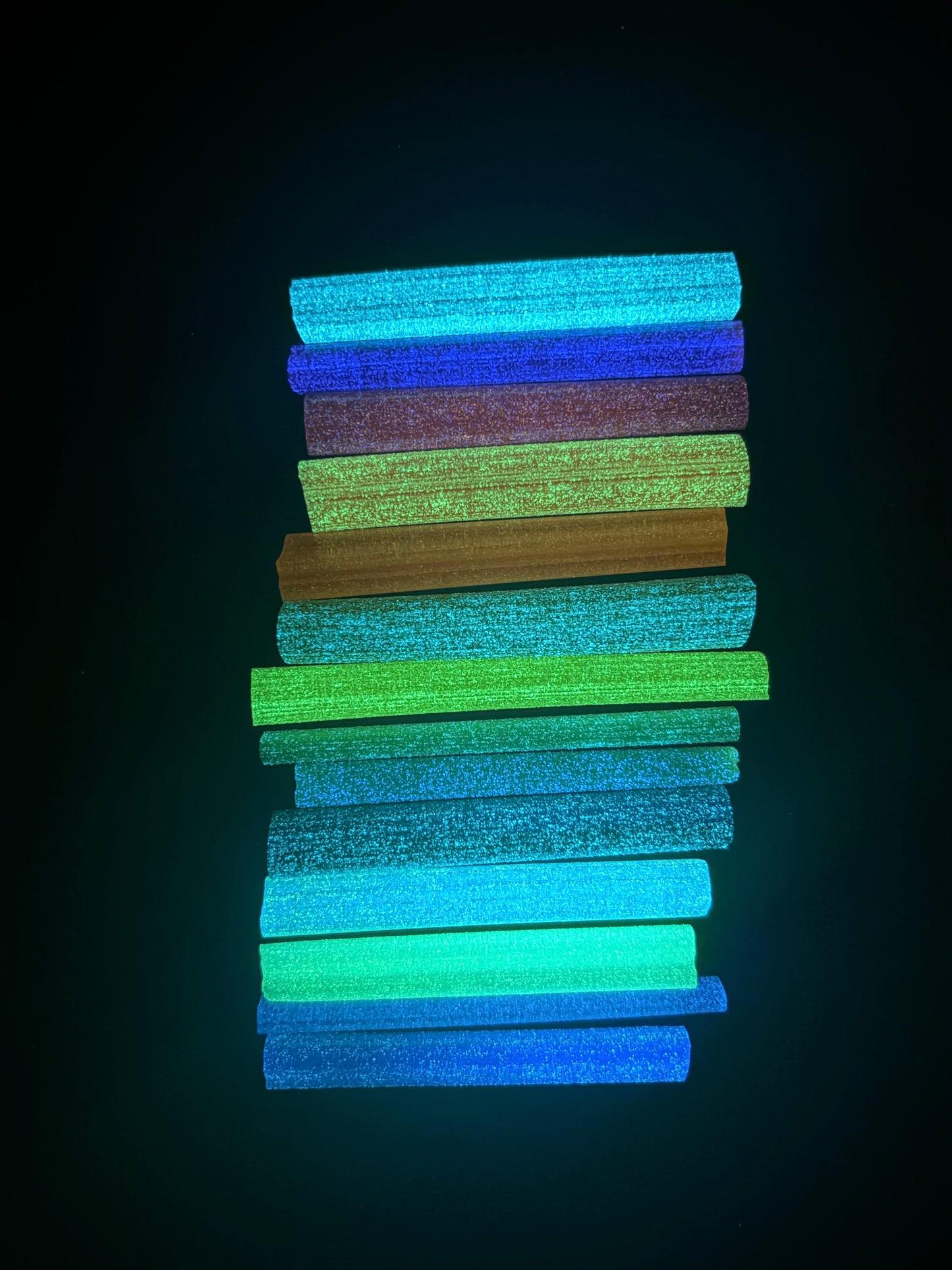 Cane in a rainbow of colours that glows different colours at night