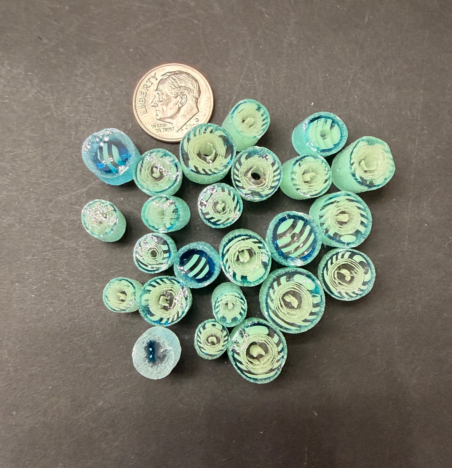 light opaque blue, transparent blue with hints of pale yellow murrini with turquoise and white  glow