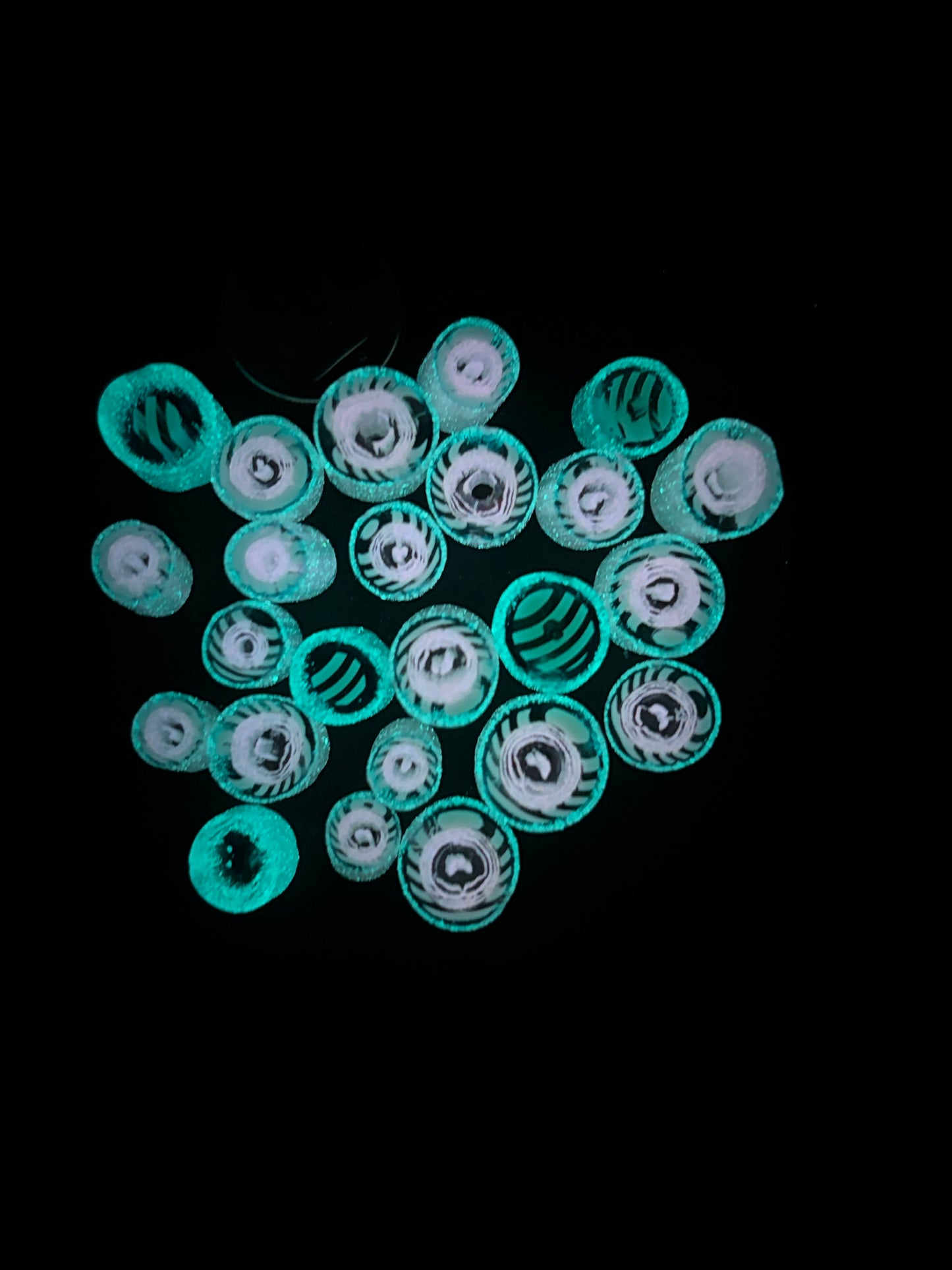 light opaque blue, transparent blue with hints of pale yellow murrini with turquoise and white  glow