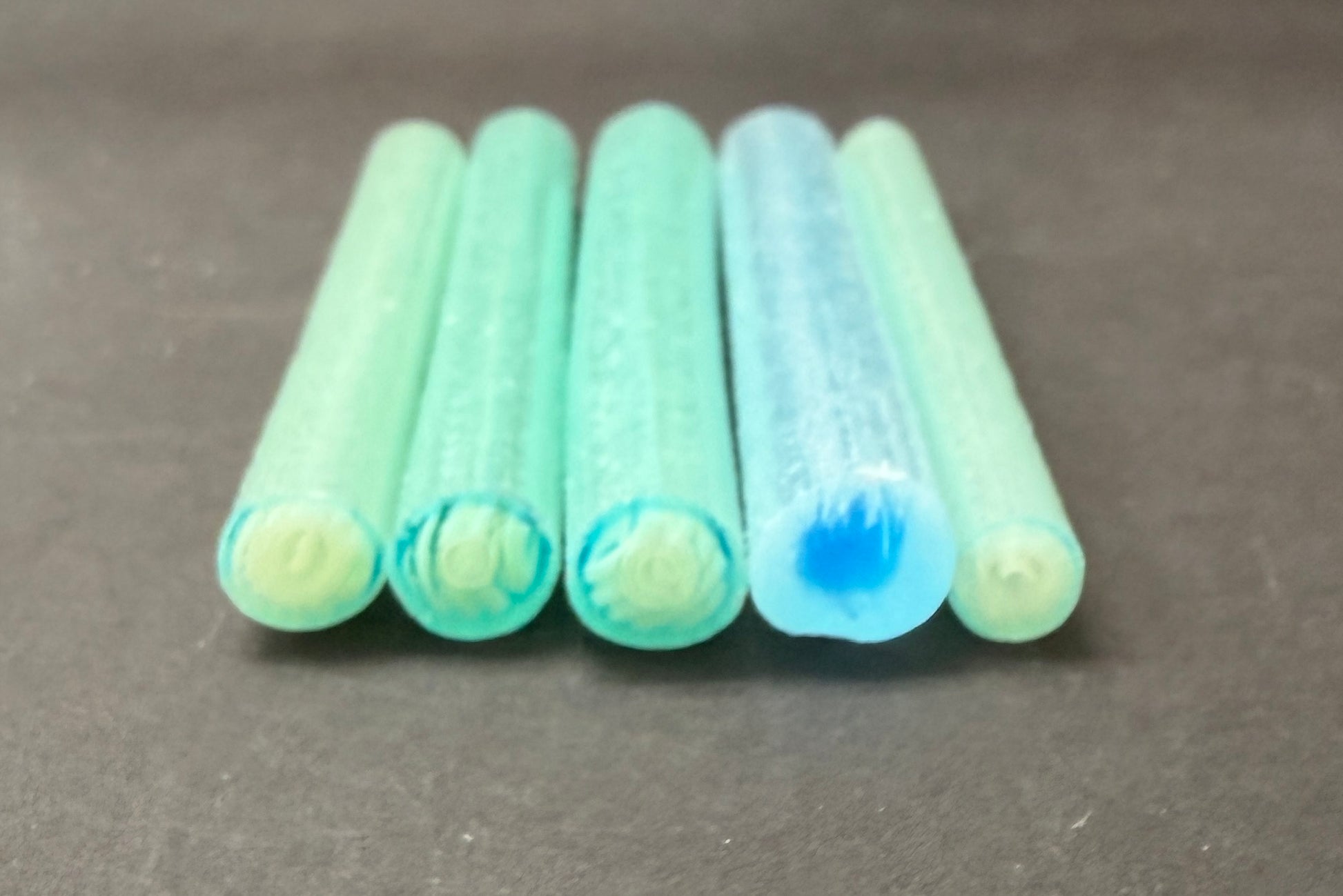 light opaque blue, transparent blue with hints of pale yellow murrini with turquoise and white  glow